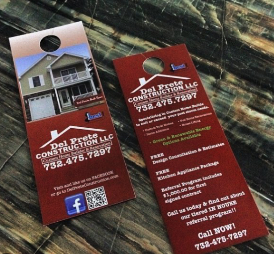 Custom home builder door hangers promoting construction and renovations.