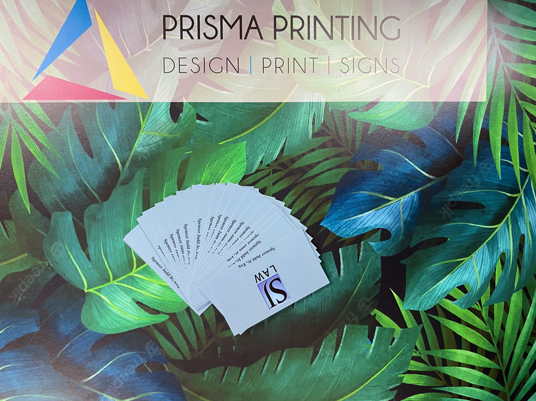 Premium business cards with a clean design, printed by Prisma Printing.