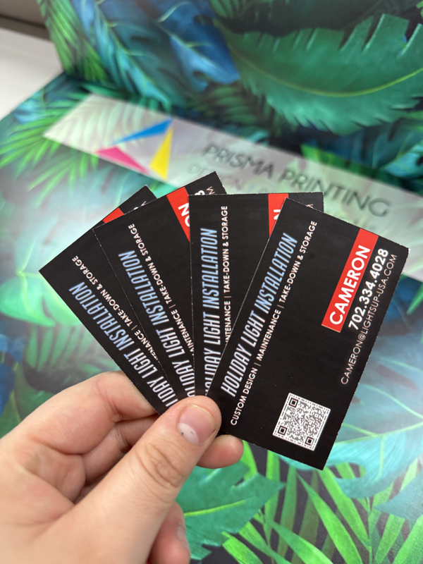 Close-up of thick business cards printed on premium cardstock for branding