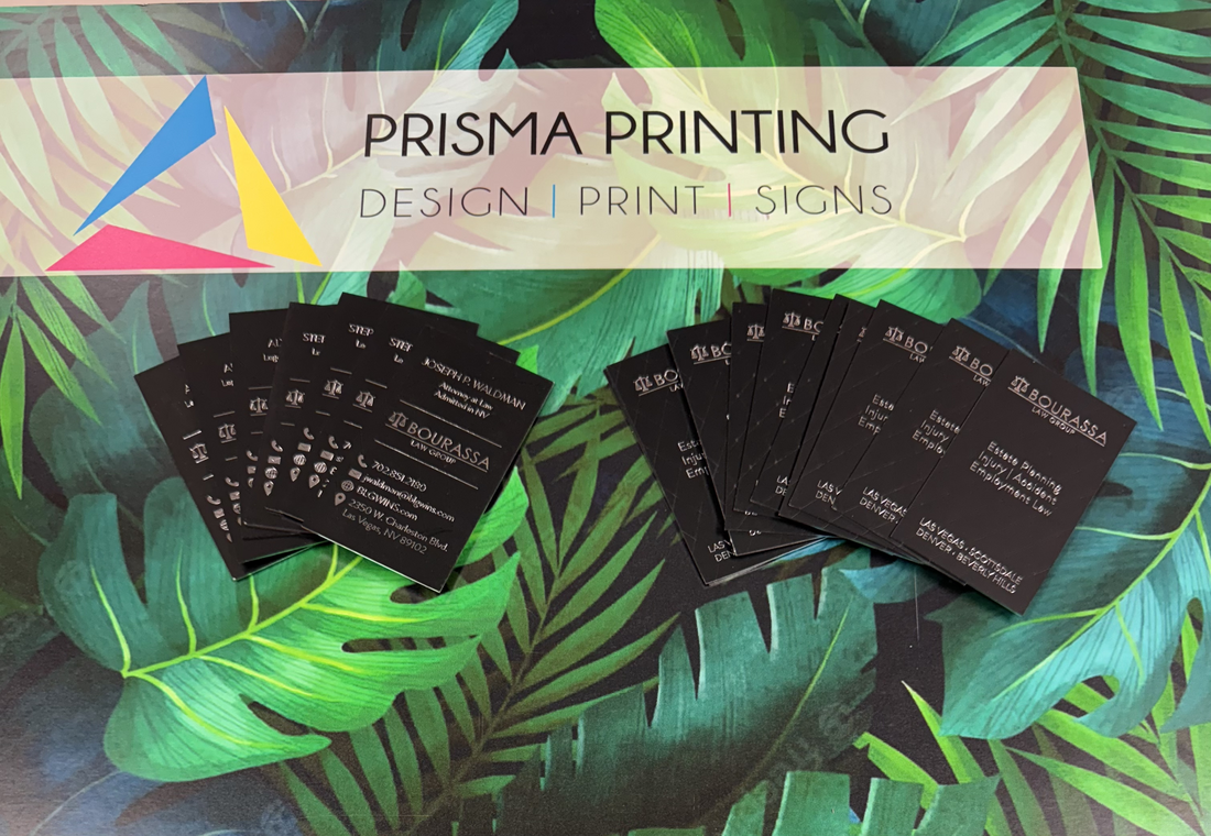 Custom designed premium business cards with sleek black and gold finish