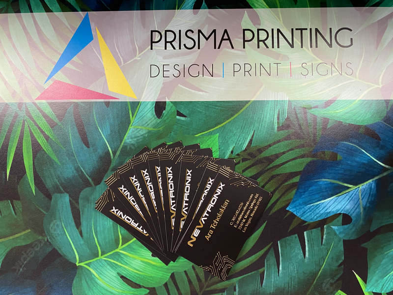 Thick business cards printed with gold accents for a professional look