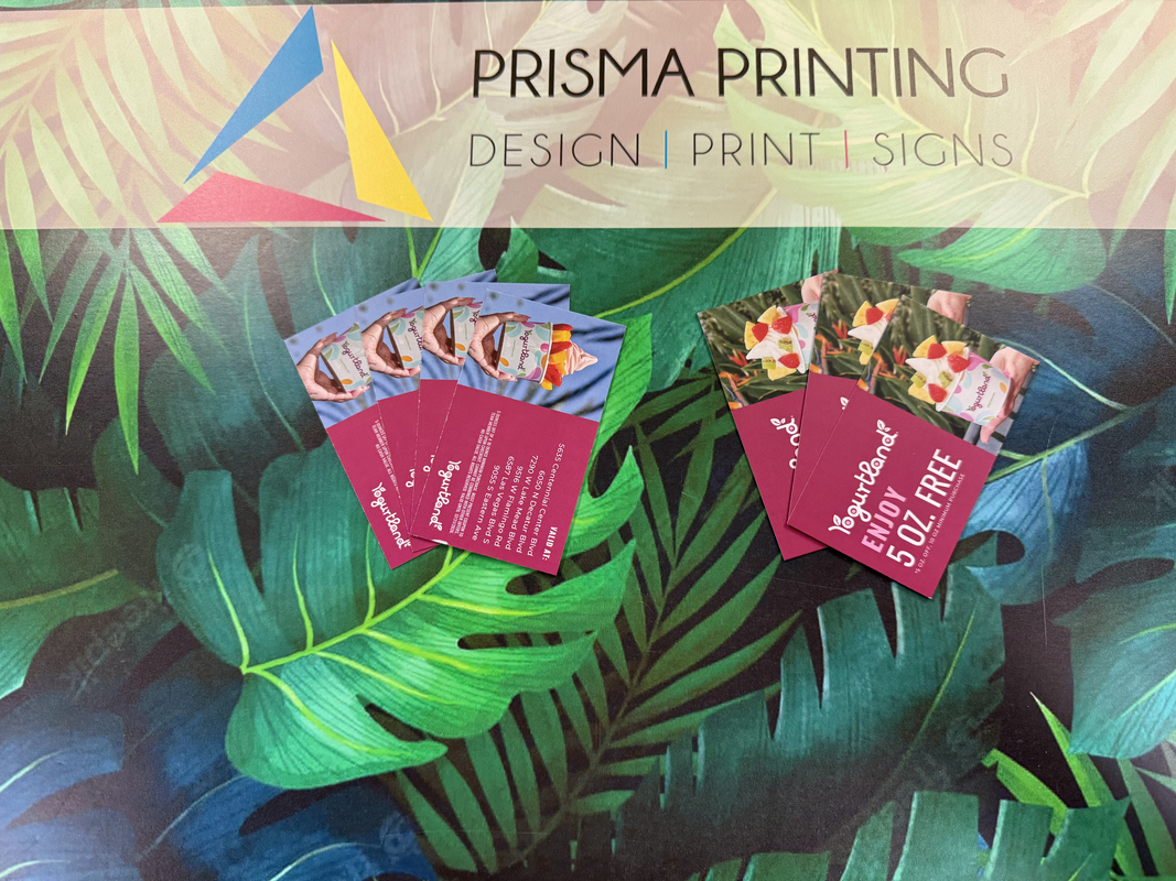 Custom professional business cards displayed on Prisma Printing mat
