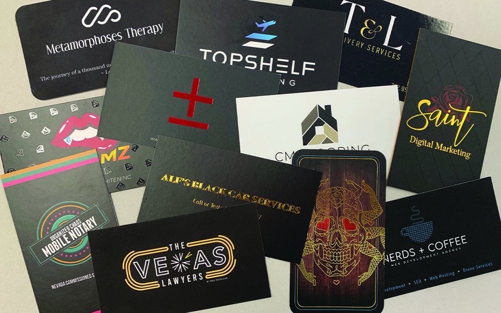 Colorful magnet business cards with bold logo stacked together