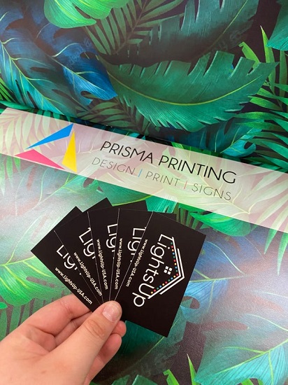 Matte finish thick stock business card in sophisticated black tone